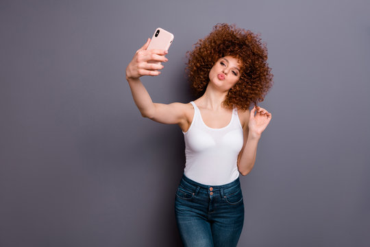 Close up photo of foxy lady hand telephone make selfies show new hairdo send air kiss wear white tank-top isolated grey background