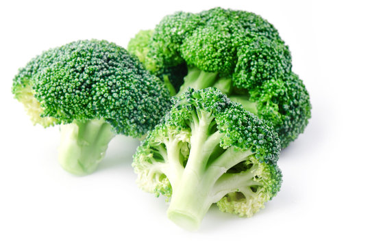 Fresh Raw Broccoli On A White Background, Side View. The Concept Of Healthy Food, Diet, Sulforaphane, Cruciferous Vegetables