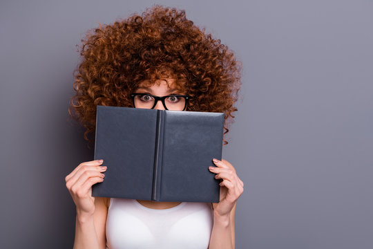 Close up photo of beautiful foxy lady reader hide facial emotions shy person wear specs white tank-top isolated grey background