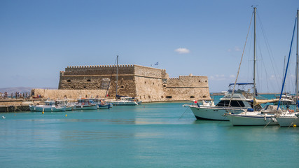 View on a Rocca a Mare fortress and port with boats in Heraklion, Crete island, Greece