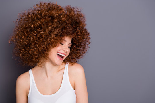 Close up photo of volume hairdo lady natural cool curls laughing nice joke wear white tank-top isolated grey background