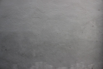 New dark grey painted plaster wall background texture