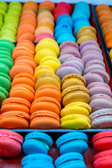 Vertical photo of colorful French macaron cake selling at bakery