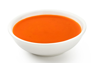 Peri peri chilli sauce in a white ceramic bowl isolated on white.