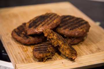 Burger patties made with 100% vegan mince. Same colour as meat, similar texture. Eating plant based...