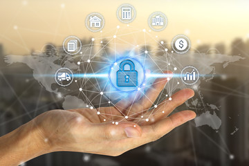 Businessman hand holding network using padlock over the Network connection technology