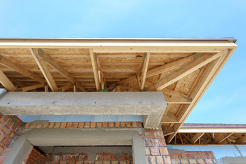 Low angle view of new home under construction