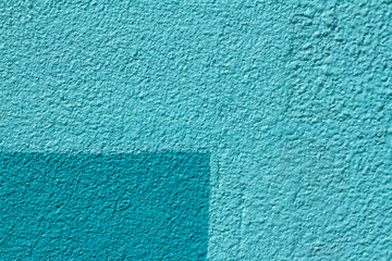 Colorful (light and dark blue) painted wall as background or texture