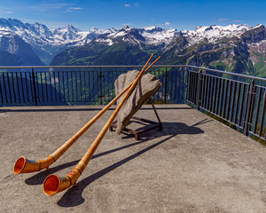 Alpine horn with the Swiss Alps in the background