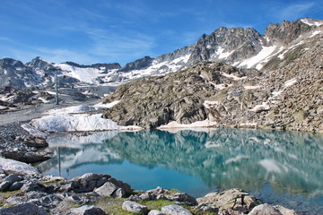 Naklejka na ściany i meble Scenic view of glacial lake in Brenta Dolomites with beautiful reflection of the rocks