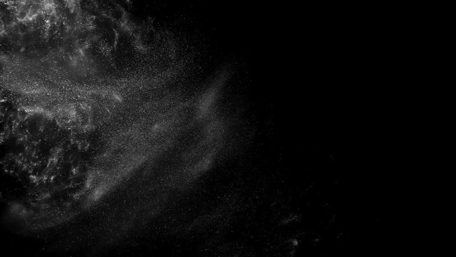 Colorful dark grey paint mixing in water. Ink swirling underwater.