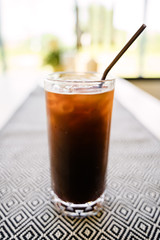 Closeup a glass of iced americano