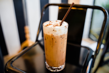 Closeup a glass of iced cappucino