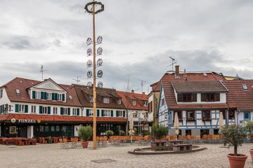 Fototapeta na wymiar Sindelfingen, Baden Wurttemberg/Germany - May 11, 2019: Central District Square, Wettbachplatz with traditional Half-timbered house facades.