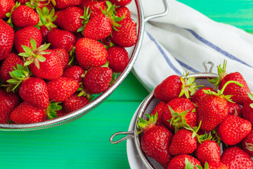 Fresh ripe red strawberries on garden's table