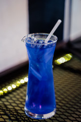 Closeup a glass of blue hawaii soda