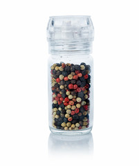 pepper mix isolated in the bottle on white background