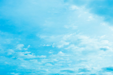 Abstract blurred beautiful clouds on blue clear sky for wallpaper.