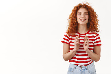 Girl believed luck her side. Optimistic good-looking redhead curly girlfriend praying cross fingers...