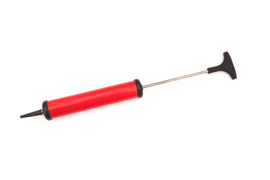 red hand pump for ball on white background.