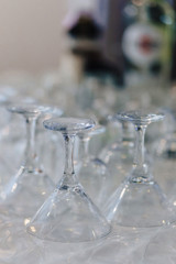 dishes on banquet tables, serving glasses, spoons and plates