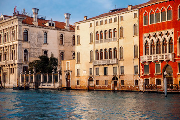 Old houses Venice, Italy along banks Grand Canal turquoise water