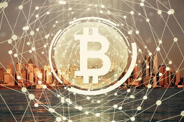 Double exposure of crypto currency theme hologram drawing and city veiw background. Concept of...
