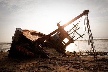 Fishing boat on the sea, .Fishing village at sunset