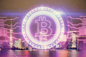 Multi exposure of cryptocurrency theme hologram drawing and city veiw background. Concept of blockchain and bitcoin.