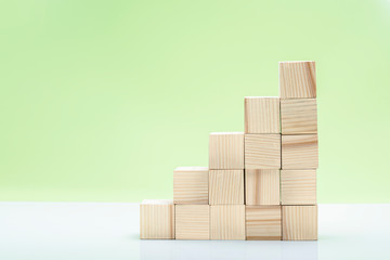 Stairs of wooden block toy on the table