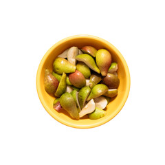 sliced pears in a yellow bowl on a white background, isolate