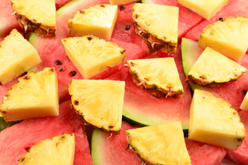 Pineapple and watermelon slices background.