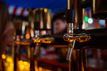 Fototapeta na wymiar Close-up beer tap in pub