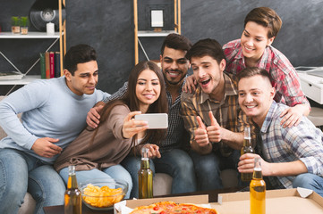 Group selfie. Cheerful people making self-portrait while partying at home