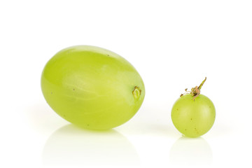 Group of two whole fresh green grape isolated on white background