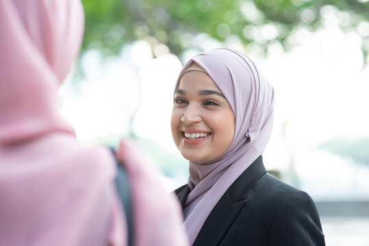 Muslim Business Woman Talking