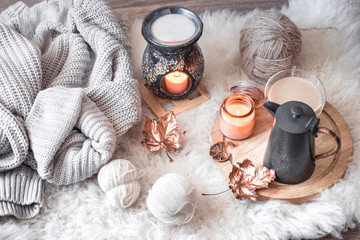 Autumn-winter Cozy home still Life with a Cup of hot drink.