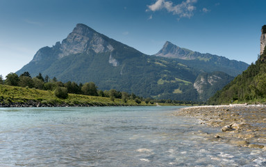 river and mountain landscape with a great view in high summer