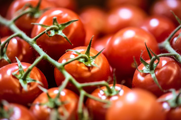 Delicious red tomatoes. Summer tray market agriculture farm full of organic vegetables
