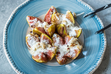 Figs with Goat Cream Cheese, Honey and Hazelnut Powder.