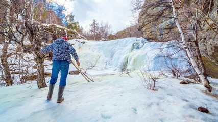 Beautiful frozen gadelsha waterfall in the southern Urals in the Republic of Bashkortostan on a...