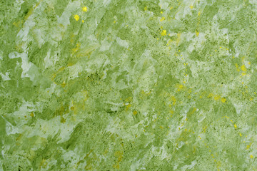  The texture of the wall is green. Abstract background.