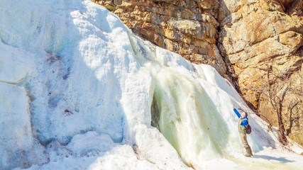 Beautiful frozen gadelsha waterfall in the southern Urals in the Republic of Bashkortostan on a...