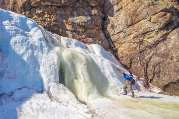 Beautiful frozen gadelsha waterfall in the southern Urals in the Republic of Bashkortostan on a...