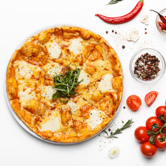 Hot cheesy italian pizza and spices on white table