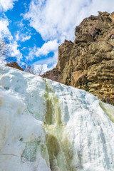 Beautiful frozen gadelsha waterfall in the southern Urals in the Republic of Bashkortostan on a...