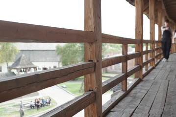 wooden railing on the castle tower