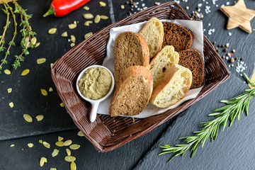basket with bread on a black background