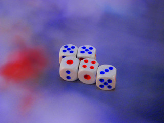 dice isolated on a blue background