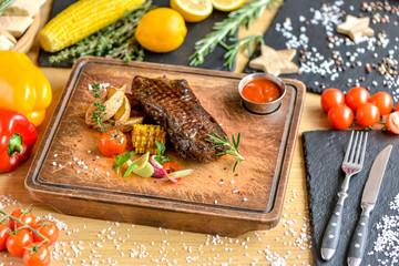 juicy steak on a board served beautifully in a restaurant